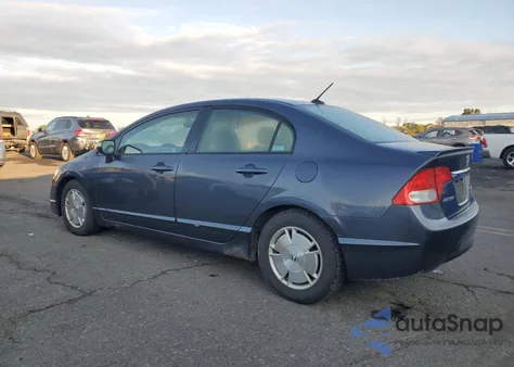 2009 Honda Civic Hybrid from USA, damaged, VIN JHMFA362X9S011167